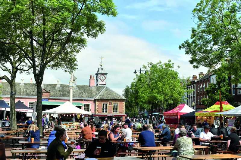 International food and craft stalls in Carlisle city centre during the August Bank Holiday market